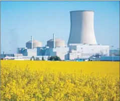  ?? GUILLAUME SOUVANT.AFP ?? A cooling tower and two reactors of a nuclear power plant in Civaux, central France, in April 2016.