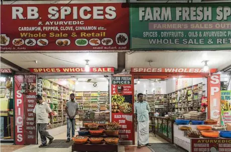  ??  ?? Spice shops in Thekkady, Kerala. People have been coming to Kerala for black pepper for centuries.