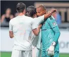  ?? DALE ZANINE/USA TODAY SPORTS ?? Crew players celebrate with goalkeeper Eloy Room after defeating Atlanta on Saturday.