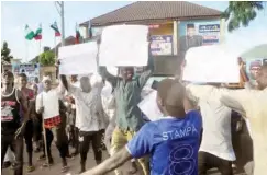  ??  ?? Some youths protest over the suspension of the APC Adamawa governorsh­ip primaries in Yola, on Tuesday Photo: NAN