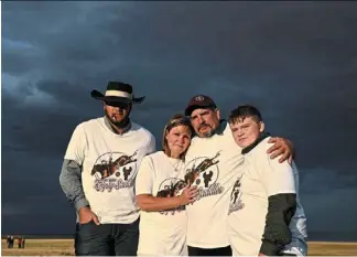  ?? ?? the family of Jonn, (from left) brother Carter, 20, mother andrea, father don, and brother Maxton, 14, standing for a portrait at sunset after speaking about the death of Jonn from fentanyl poisoning.