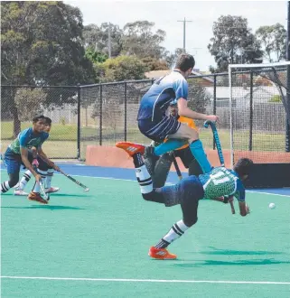  ?? Pictures; DEBBIE REILLEY ?? OVER THE TOP: Geelong’s Jonah McKinnon gets airborne.