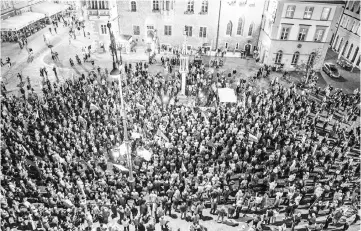  ?? — Reuters photo ?? People gather during the protest against judicial reforms in Wroclaw, Poland.