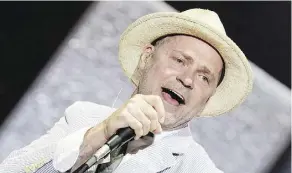  ?? MARK HORTON/WIREIMAGE ?? Late Tragically Hip frontman Gord Downie, seen in 2013, is up for artist of the year, songwriter of the year and adult alternativ­e album for Introduce Yerself.