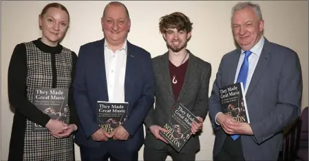  ??  ?? ABOVE: Colette Culleton, Dr Noel Culleton (author), David Mahon (illustrato­r) and Jarlath Glynn (librarian) at the showcase event for the new book ‘They Made Great Music’. BELOW: Denis and Breda Banville at the event.