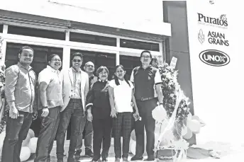  ??  ?? Officers and executives of Tri-Foods and Puratos during the launching of Tri-Foods Innovation Center at Obrero, Davao City.