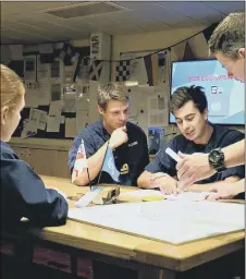  ?? ?? Sailors on HMS Tamar in the East China Sea