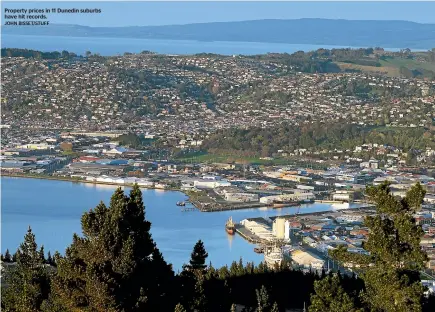  ?? JOHN BISSET/STUFF ?? Property prices in 11 Dunedin suburbs have hit records.