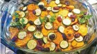  ??  ?? While a stratta usually includes eggs, this divine autumn version is made of layers of sweet potatoes, fennel, onions and baby turnips. Accented with olive oil, garlic and thyme, and garnished with pitted Kalamata olives.