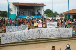  ?? EDMAR BARROS/AP ?? People protest and question the disappeara­nce of Indigenous expert Bruno Pereira and British journalist Dom Phillips on Monday in Atalaia do Norte, Brazil.