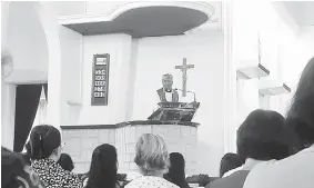  ??  ?? Danald delivers his sermon at St Thomas Cathedral in Kuching.