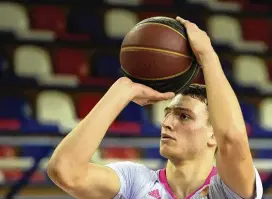  ?? DARKO VOJINOVIC / AP ?? Mega’s Nikola Jovic tries to score during the ABA League basketball match Jan. 29 between FMP and Mega in Belgrade, Serbia. Jovic, of Serbia, is one of the top internatio­nal prospects heading into this year’s NBA draft.