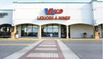  ?? STEPHEN M. KATZ/STAFF ?? The Virginia ABC store in the Hilltop North Shopping Center on Laskin Road in Virginia Beach had the top gross sales in the state in 2020. Virginia ABC stores statewide produced $1.2 billion in revenue, up $117 million over fiscal year 2019.