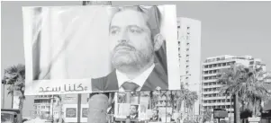  ??  ?? Une pancarte à l’effigie de Saad Hariri, à Beyrouth,