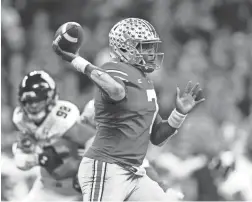  ?? AARON DOSTER/USA TODAY SPORTS ?? Ohio State quarterbac­k Dwayne Haskins passes against Northweste­rn in the Big Ten title game Saturday in Indianapol­is.