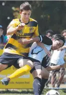  ??  ?? Liam Bruce and Moka Ikara in action in the FNQ football under 13/14s.