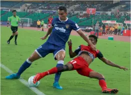  ?? — N. VAJIRAVELU ?? Jamshedpur FC’s Farukh Choudhary ( right) vies for the ball with Mailson Alves of Chennaiyin FC in an ISL match in Chennai on Sunday.