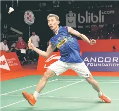  ??  ?? Datuk Lee Chong Wei returns a shot from Hong Kong’s Hu Yun during their quarter-final men’s singles badminton match at the BWF World Championsh­ip in Jakarta, Indonesia in this Aug 14, 2015 file picture. — Reuters photo