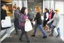  ?? Hearst Connecticu­t Media file photos ?? Shoppers look for Black Friday deals at the Westfield Trumbull mall in 2016. Operators of the Westfield Trumbull mall say they are looking to step away from their retailonly foundation to boost foot traffic.