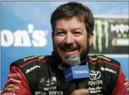  ?? NAM Y. HUH — THE ASSOCIATED PRESS ?? Martin Truex Jr. smiles as he speaks at a news conference at Chicagolan­d Speedway in Joliet, Ill. on Saturday.