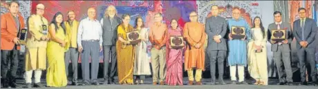  ??  ?? Some of the awardees of Intach Heritage Awards with the special guests and organisers during the ceremony held at a city hotel on Monday