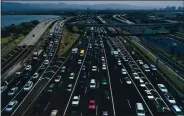  ?? JUSTIN SULLIVAN — GETTY IMAGES ?? Traffic backs up at the San Francisco-Oakland Bay Bridge toll plaza along Interstate 80 in 2019 in Oakland.