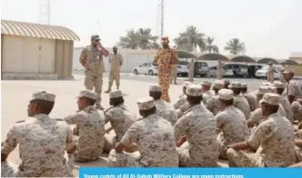  ??  ?? Young cadets at Ali Al-Sabah Military College are given instructio­ns.