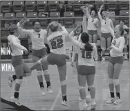  ?? MARK HUMPHREY ENTERPRISE-LEADER ?? Farmington volleyball players celebrate an ace during a 4-set win over Berryville on Sept. 18 at Cardinal Arena.