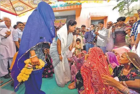  ??  ?? Rajasthan chief minister Vasundhara Raje in Bithur. The women of this village took up the challenge that the men wouldn’t — to bring down power losses. HT FILE