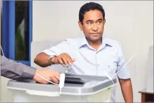  ?? MALDIVES PRESIDENCY/AFP ?? Maldives President Abdulla Yameen votes at a polling station in the capital Male on Sunday.