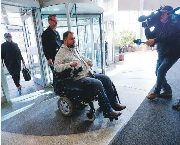  ?? SEAN KILPATRICK / THE CANADIAN PRESS ?? Witness Andrew Olivier arrives on Friday to the Election Act bribery trial of two top Ontario Liberals in Sudbury.