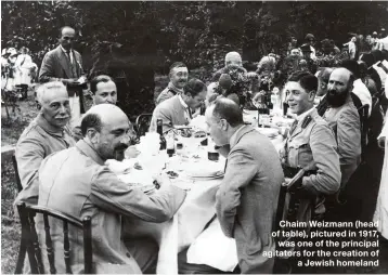  ??  ?? Chaim Weizmann (head of table), pictured in 1917, was one of the principal agitators for the creation of a Jewish homeland