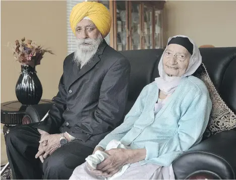  ?? NICK PROCAYLO ?? Darshan Singh Khun Khun and Amar Kaur Khun Khun, who celebrated their 80th wedding anniversar­y last week, relax at their Surrey home on Thursday. The couple wed in 1937 when they were both 12. “They had never even seen each other,” grandson Jaskarn...