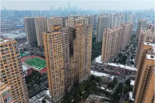  ?? AFP PHOTO ?? THE MOURNING AFTER
An aerial view of the fire-struck residentia­l building in Nanjing, capital of Jiangsu province, eastern China, on Friday, Feb. 23, 2024.