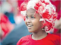  ?? PHOTOS: ASHLEY FRASER/OTTAWA CITIZEN ?? Seven-year-old Yusuf Ahmed was all smiles at the Canada Day noon show on Parliament Hill.