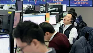  ?? AP ?? Markets can’t doze off awaiting the results of trade negotiatio­ns between the US and China. —