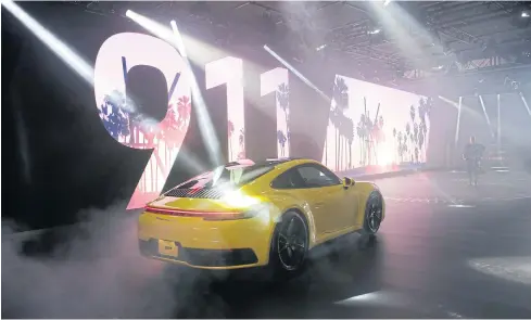  ?? AP ?? The 2020 Porsche 911 is unveiled at the 2018 Los Angeles Auto Show on Wednesday.