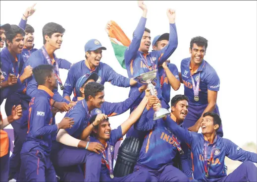  ?? ?? FOR THE FIFTH TIME! India’s U19 cricket team celebrates their ICC World Cup title triumph