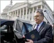  ?? ANDREW HARNIK — THE ASSOCIATED PRESS ?? Sen. Al Franken, D-Minn., leaves the Capitol after speaking on the Senate floor, Thursday on Capitol Hill in Washington. Franken said he will resign from the Senate in coming weeks following a wave of sexual misconduct allegation­s and a collapse of...