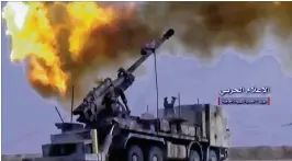  ?? SYRIAN CENTRAL MILITARY MEDIA ?? A still from video provided Wednesday by the government-controlled Syrian Central Military Media shows fifiring on militant positions on the Iraq-Syria border. Offifficia­ls said Islamic State militants left their last stronghold after a government...