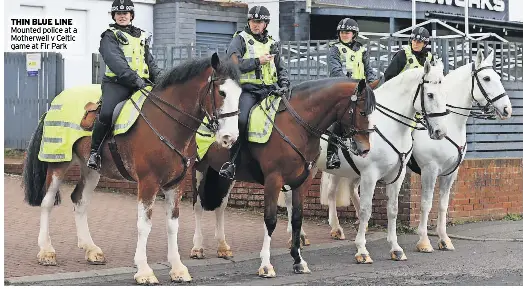  ?? ?? THIN BLUE LINE
Mounted police at a Motherwell v Celtic game at Fir Park