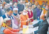  ?? HT ?? BJP candidate filing nomination in the presence of chief minister Yogi Adityanath and deputy chief ministers Dinesh Sharma and Keshav Maurya.