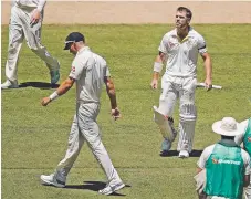  ??  ?? Warner and English bowler Tom Curran engage in a heated exchange of words.