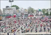  ?? ANI ?? ■
Migrants wait for a train in Bhopal on May 16.