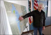  ?? ?? Jerry Brown, executive director of the Sites Project Authority, shows the proposed reservoir site on a map at the agency's office in Maxwell.