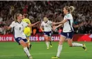  ?? Tom Jenkins/The Guardian ?? Alessia Russo (right) celebrates with Georgia Stanway after opening the scoring for England in the first half. Photograph: