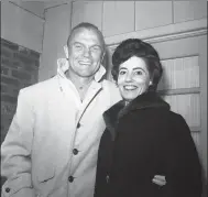  ?? BOB SCHUTZ — THE ASSOCIATED PRESS FILE ?? Astronaut John Glenn poses with his wife, Annie, Feb. 3, 1962outsid­e their Arlington, Va., home during his first news conference. Glenn, the widow of astronaut and U.S. Sen. John Glenn and a communicat­ion disorders advocate, died Tuesday, May 19, 2020, of COVID-19complica­tions at a nursing home near St. Paul, Minn., at age 100.