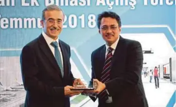  ??  ?? Turkey Defence Industry president Professor Ismail Demir (left) and Istanbul Sabiha Gokcen Internatio­nal Airport board chairman Datuk Mohd Izani Ghani at the launch of its new domestic boarding hall in Istanbul, Turkey, recently.