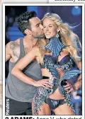  ??  ?? 2 ADAMS: Anne V, who dated Adam Levine (above), is suing baby daddy Adam Cahan (top).