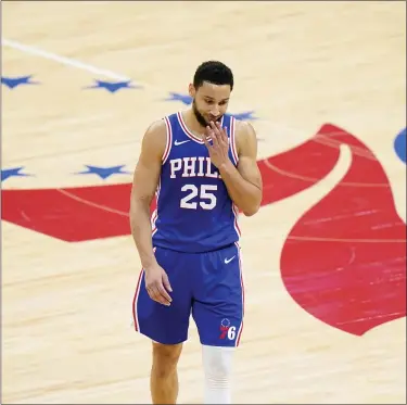  ?? MATT SLOCUM — THE ASSOCIATED PRESS ?? Ben Simmons wipes his face after missing a pair of free-throws in the first half. Simmons was 4-for-14 from the line in the 109-106loss to the Hawks that put the Sixers in a 3-2series hole.